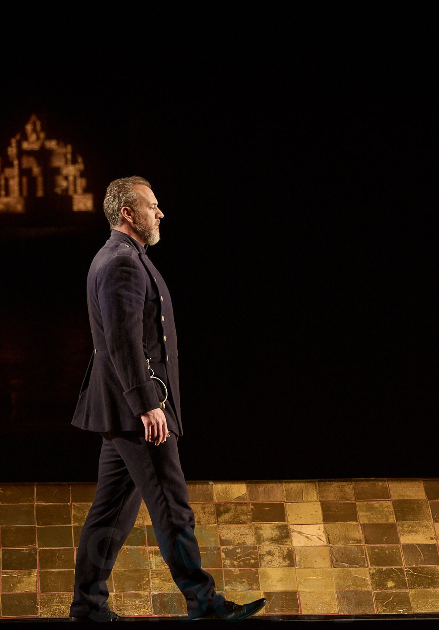 Christian Van Horn as Duke Bluebeard walking across the stage at the Four Seasons Centre in Toronto.