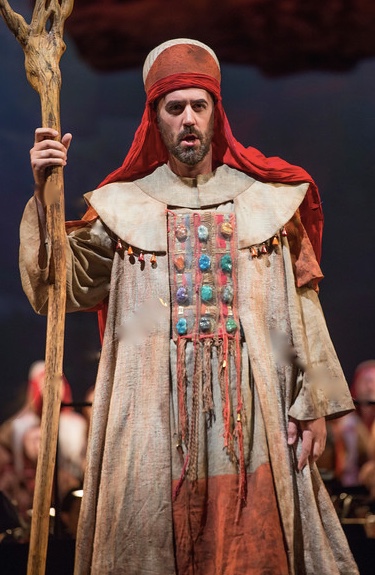 Christian Van Horn as Zaccaria holding a staff at Seattle Opera.